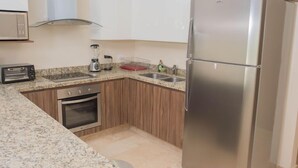 Apartment, 2 Bedrooms | Private kitchen | Coffee/tea maker, full-size fridge, microwave, oven - Paramar 003 (Tulum)