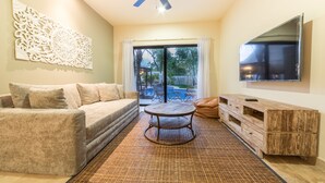 Apartment, 2 Bedrooms, Pool View | Living room | Flat-screen TV - Paramar Terra C04 (Tulum)