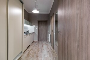 Superior Apartment | Private kitchen | Fridge, microwave, stovetop, electric kettle