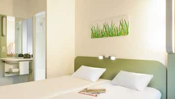 Quartos à prova de som, Wi-Fi de cortesia, roupa de cama