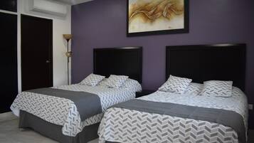 2 bedrooms, minibar, blackout drapes, iron/ironing board