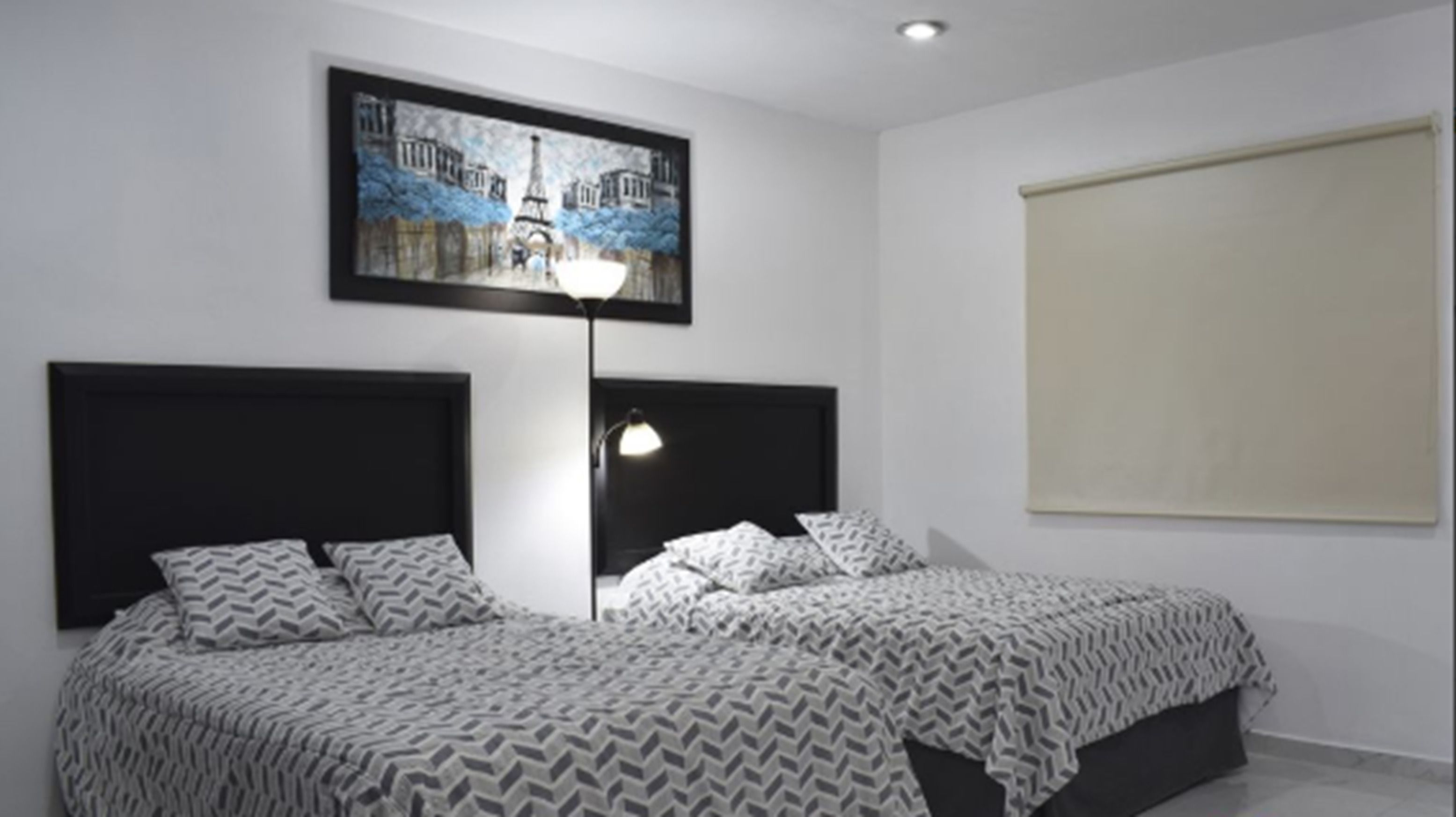 deluxe double room, 2 double beds, accessible, pool view | 2 bedrooms, minibar, individually furnished, blackout curtains