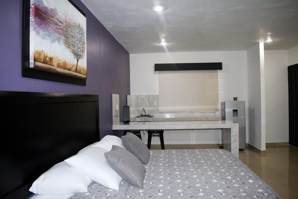 deluxe double room, 2 double beds, accessible, pool view | private kitchen