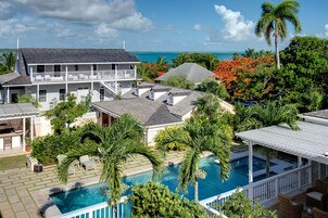 Outdoor pool, pool umbrellas, sun loungers