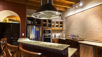 Fridge, stovetop, toaster, cookware/dishes/utensils