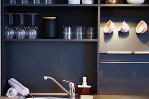 Fridge, microwave, stovetop, coffee/tea maker