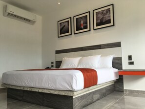 Standard Room, 1 King Bed | Minibar, desk, blackout drapes, iron/ironing board