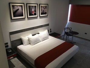 Standard Room, 1 King Bed | Minibar, desk, blackout drapes, iron/ironing board