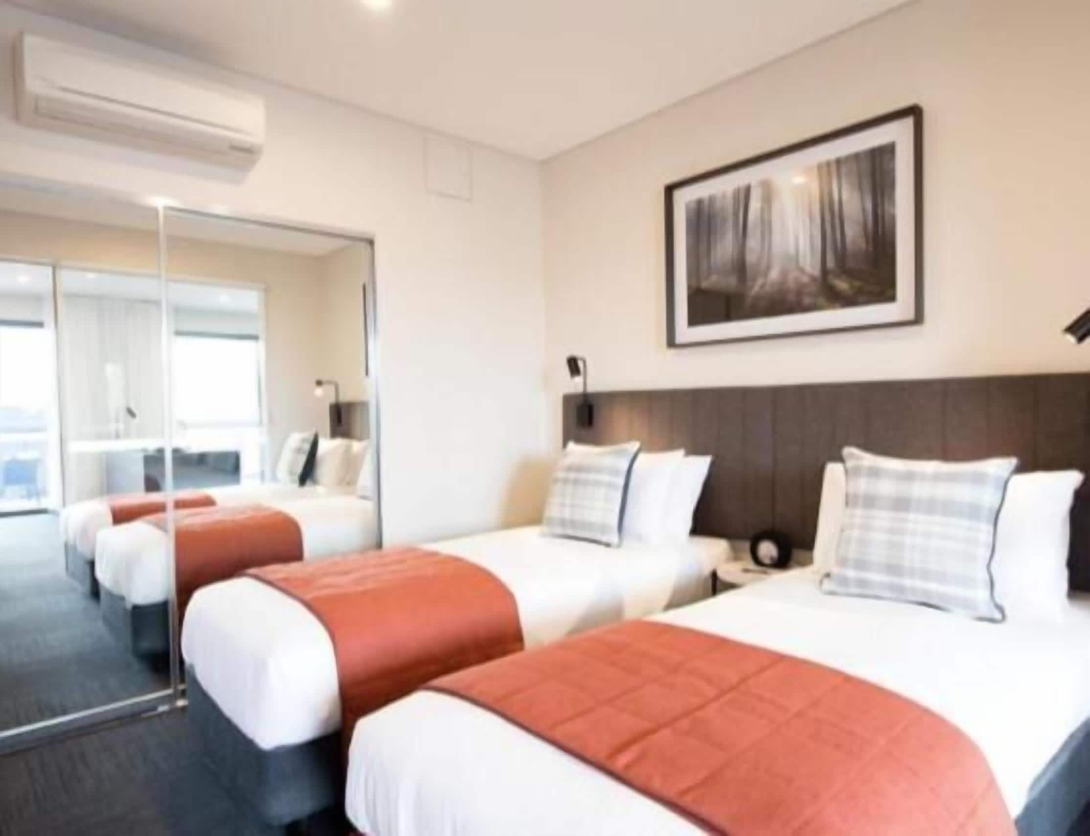 premium bedding, select comfort beds, in-room safe, desk