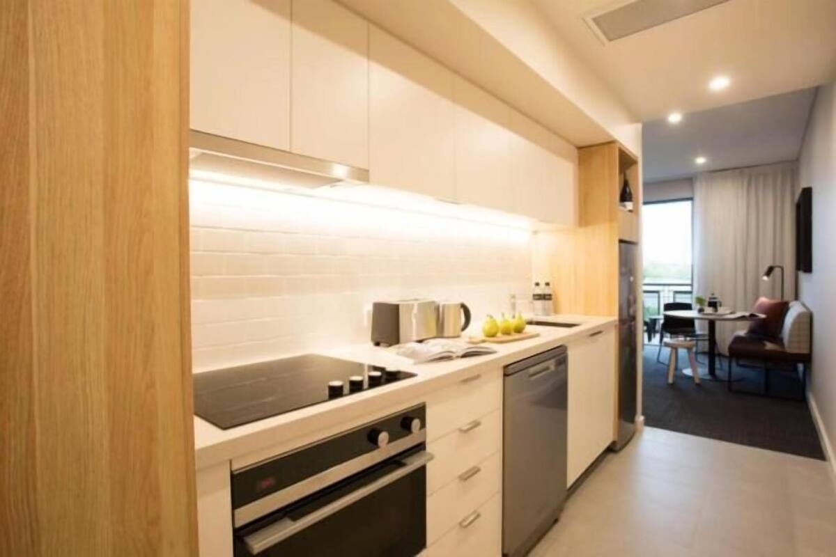 two bedroom apartment | private kitchen | full-sized fridge, microwave, stovetop, coffee/tea maker