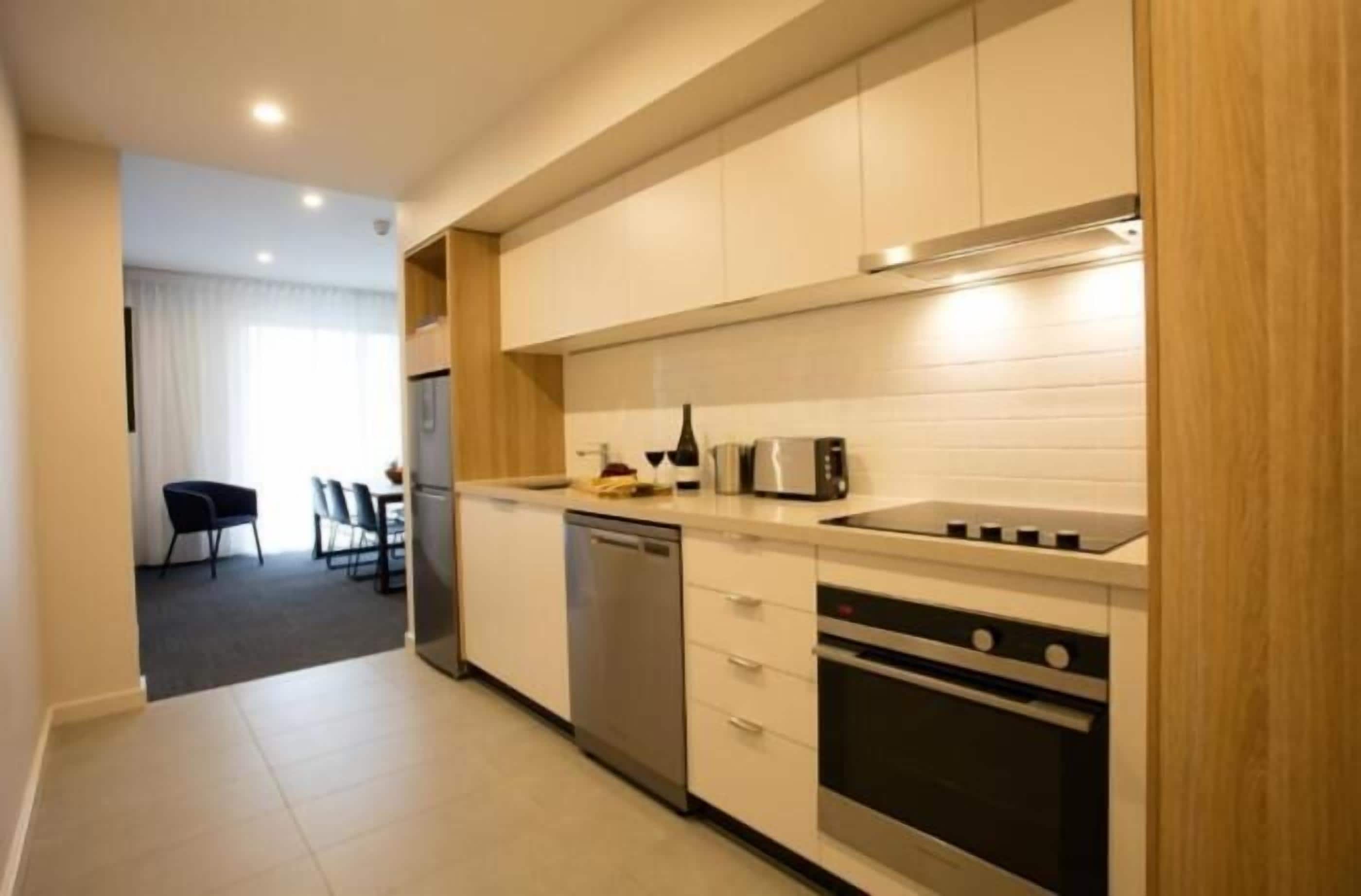 two bedroom apartment | private kitchen | full-sized fridge, microwave, stovetop, coffee/tea maker