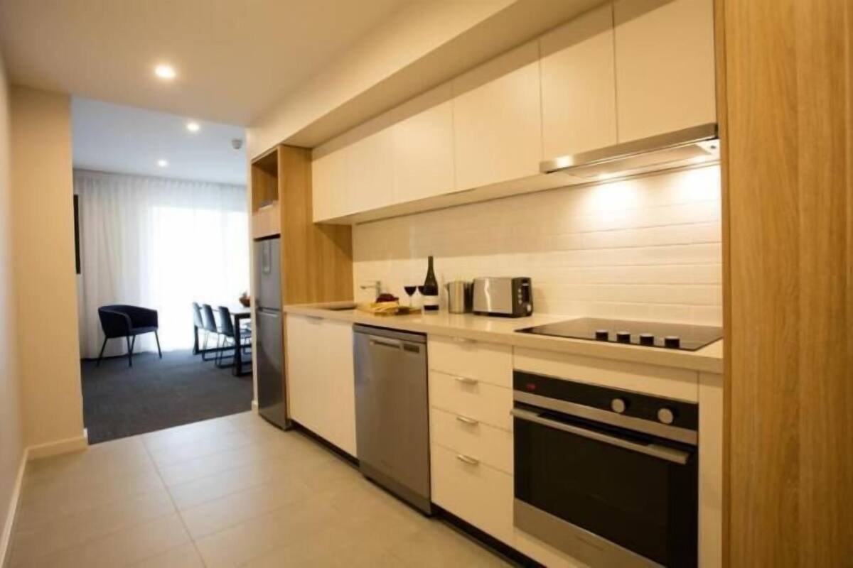 two bedroom apartment | private kitchen | full-sized fridge, microwave, stovetop, coffee/tea maker