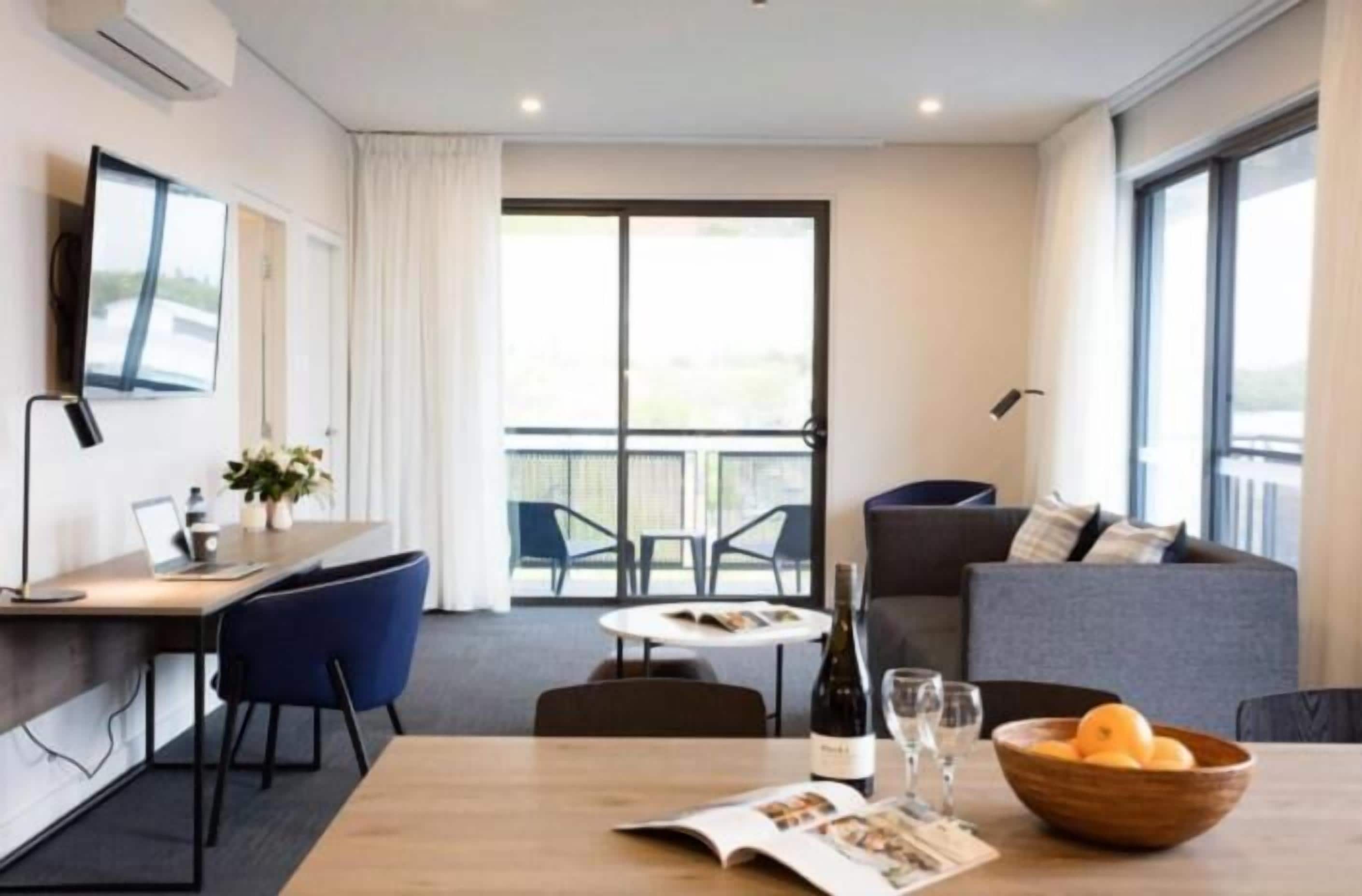 two bedroom apartment | living room | smart tv, netflix, first-run films, pay films