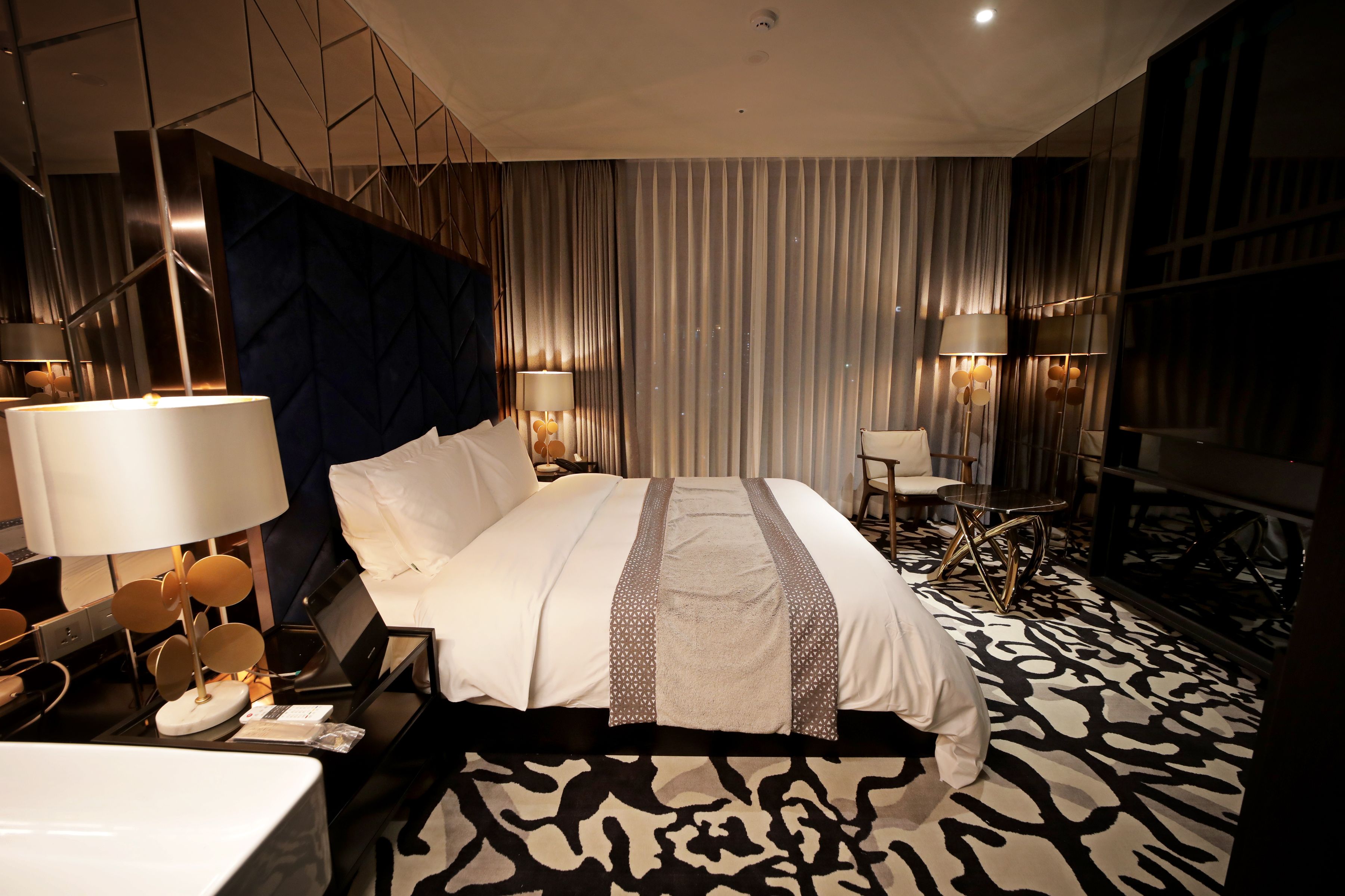 champagne gold | in-room safe, blackout curtains, soundproofing, iron/ironing board