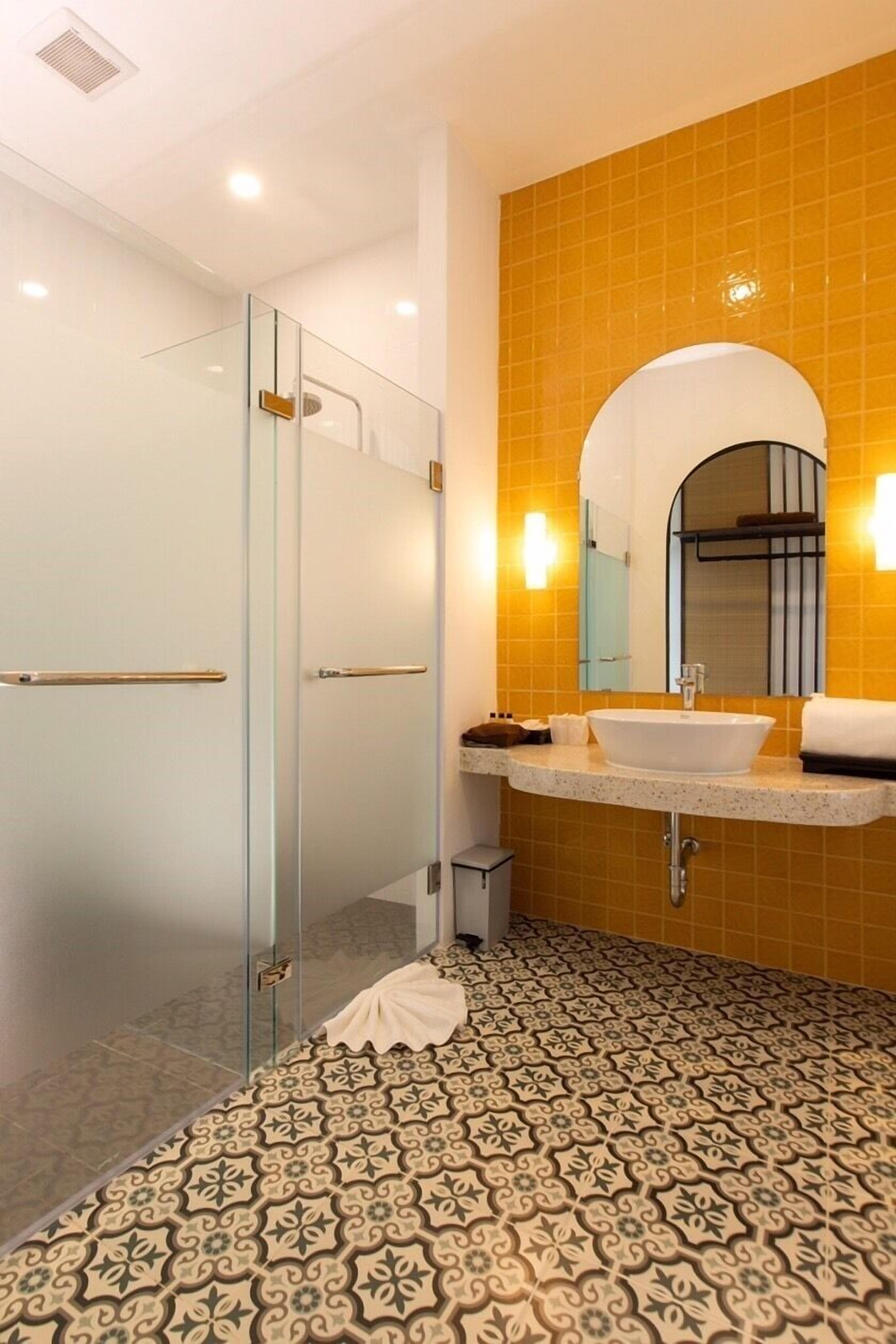 yellow room pool access | bathroom | shower, rainfall showerhead, free toiletries, hair dryer