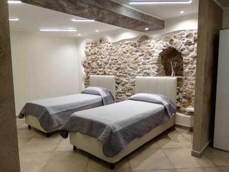 2 habitaciones, ropa de cama de alta calidad y camas con efecto memoria