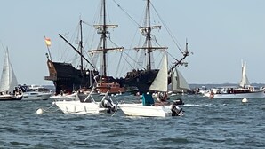 A harbor with several sailboats, including a large ship with multiple masts and a smaller boat with a motor. - Caravelles palace ***** the most beautiful apartment in Arcachon on the beach (Arcachon)