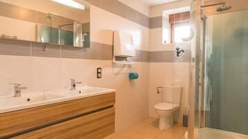 Combined shower/tub, hair dryer, towels, soap