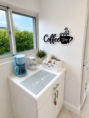 A kitchen with a coffee maker, a coffee bar, and a wall sign that says 'Coffee Time'. - 3BR Hot Tub Dockside 2mi. FLL 4 mi. Bch. & Pt. Everglades (Dania Beach)
