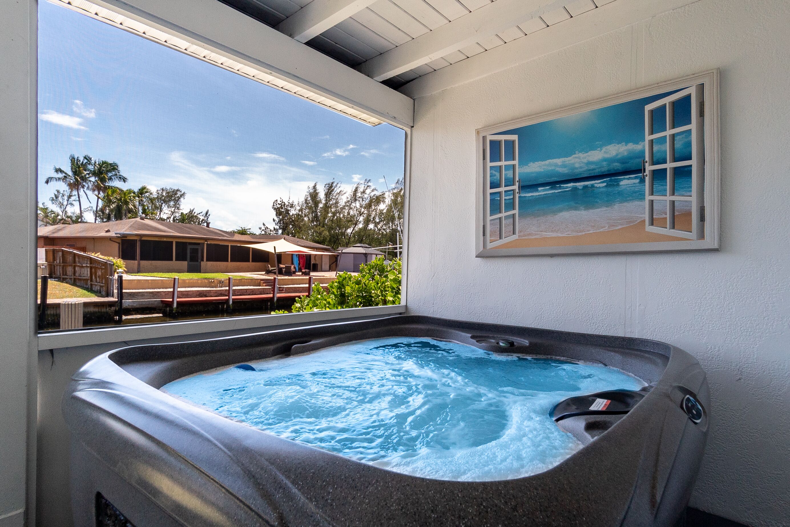 Tropical oasis with canal views. A fishing adventure near the beach!