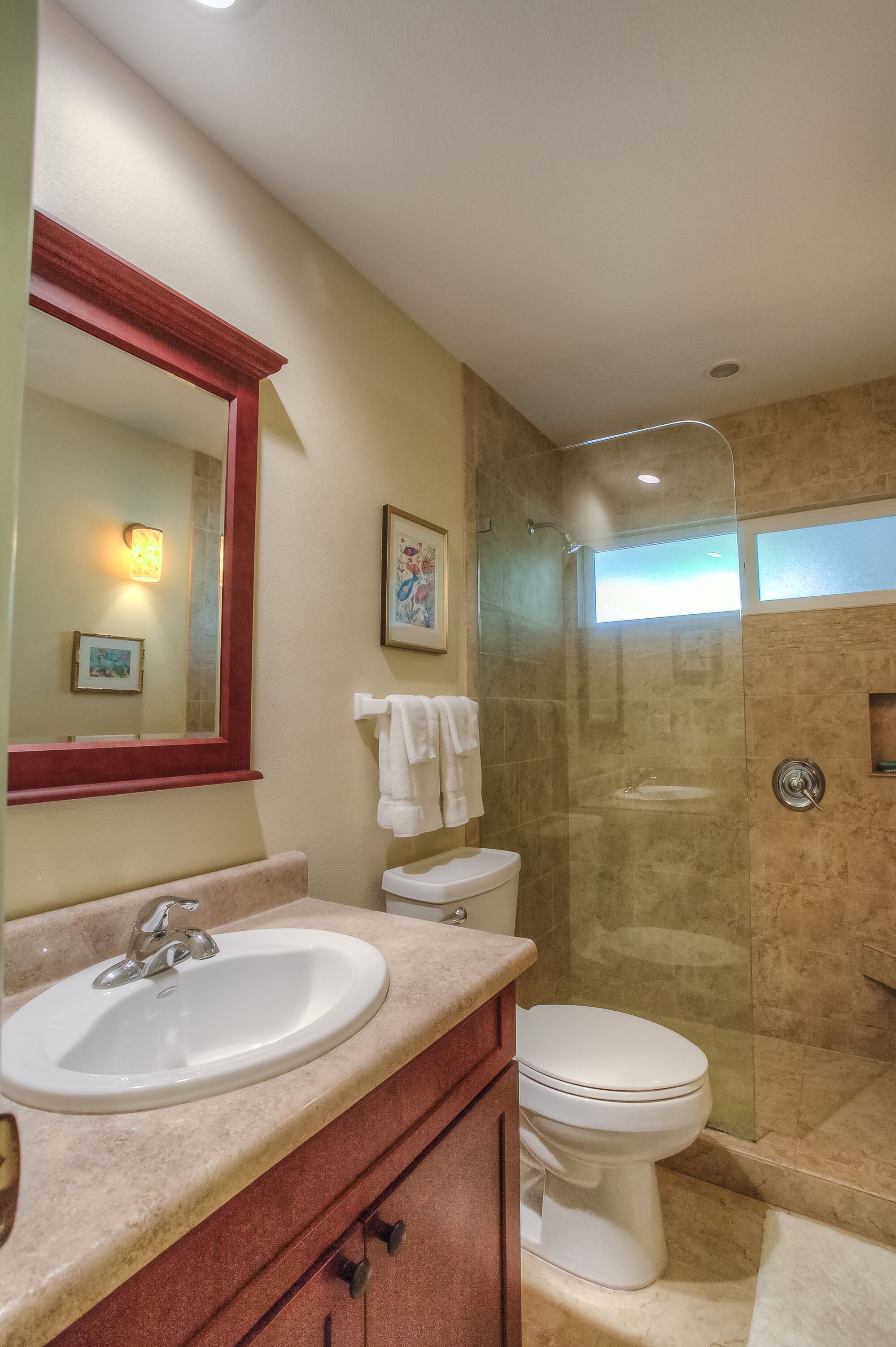 Shower, hair dryer, towels, toilet paper