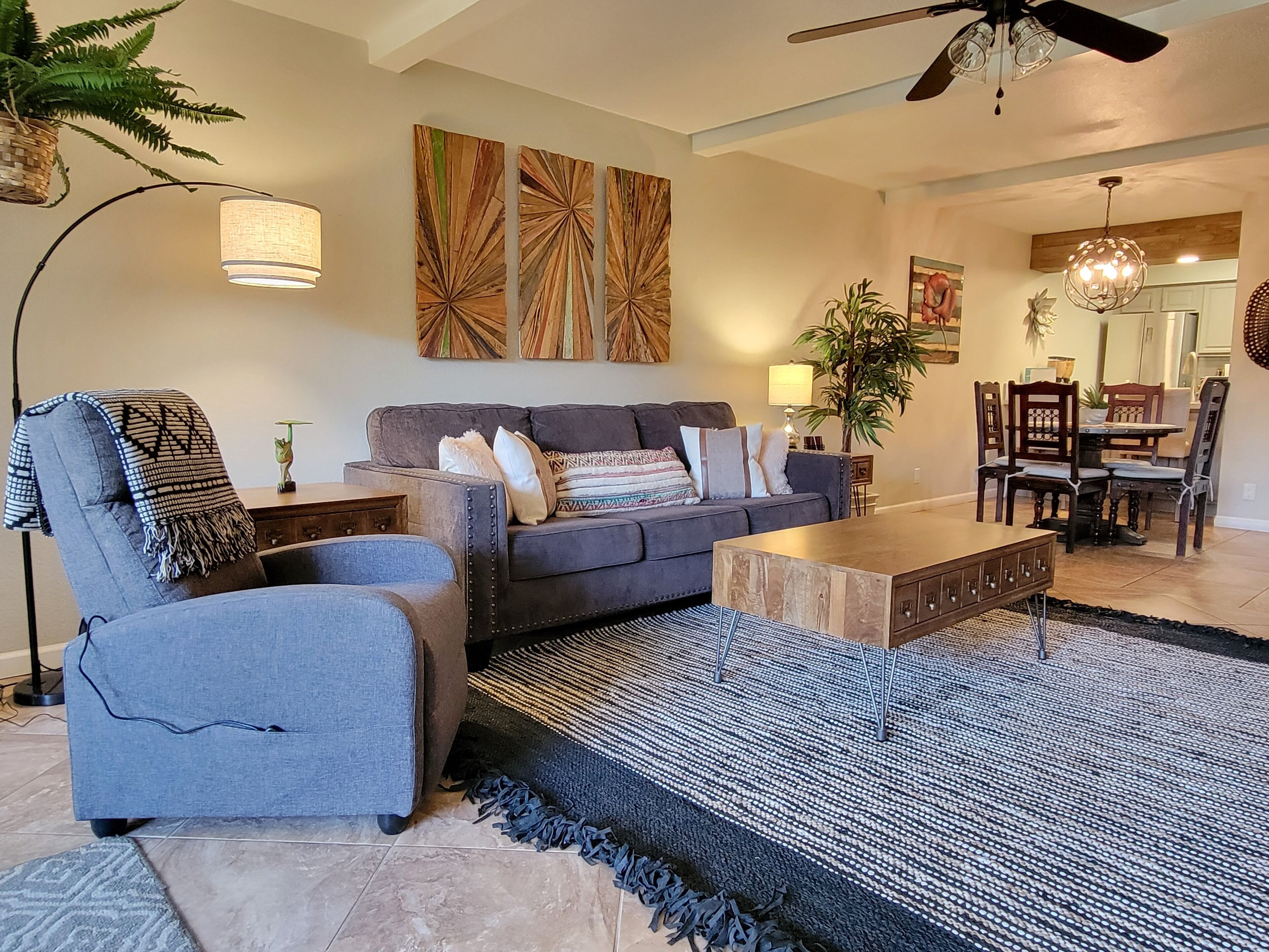 Living room features a comfortable queen size sleeper sofa 