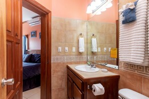 Shower, towels, soap, toilet paper