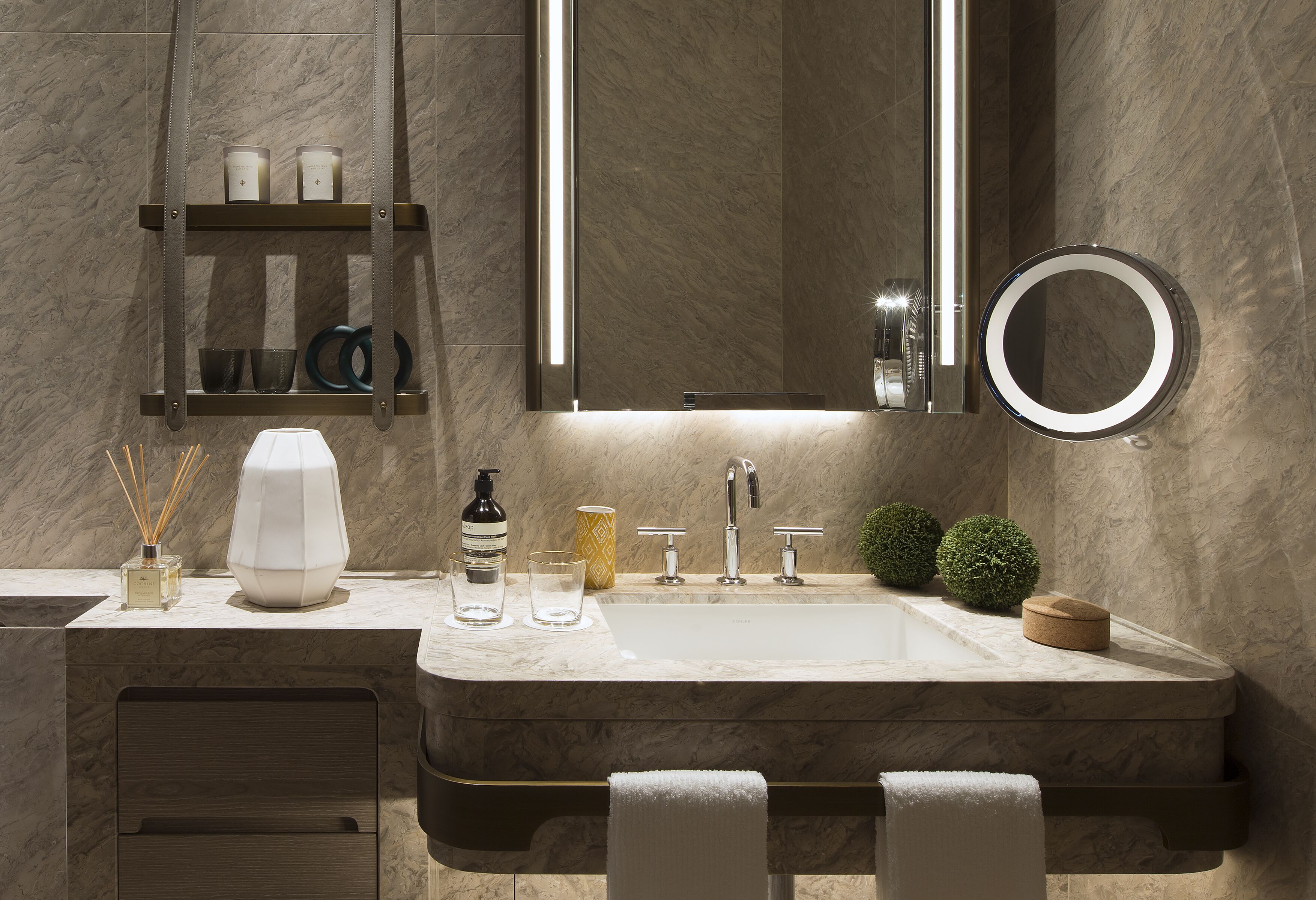 designer toiletries, hair dryer, bathrobes, slippers