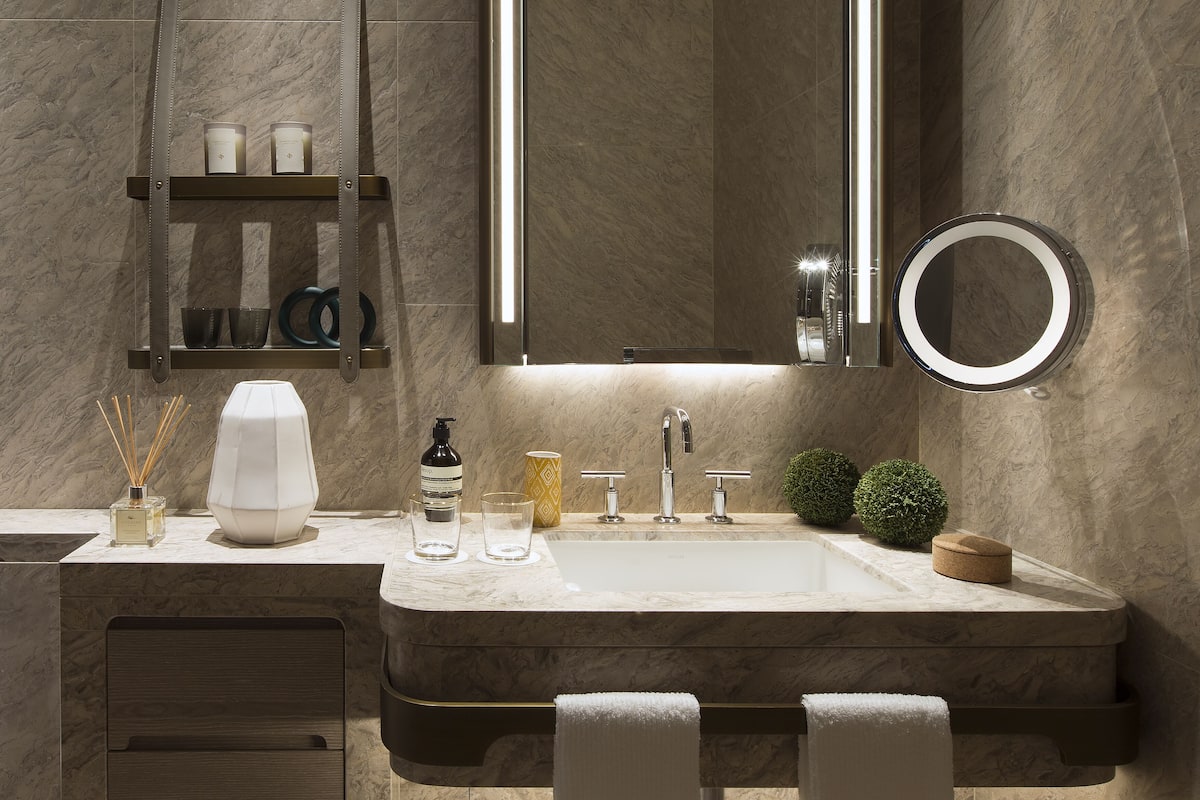 designer toiletries, hair dryer, bathrobes, slippers