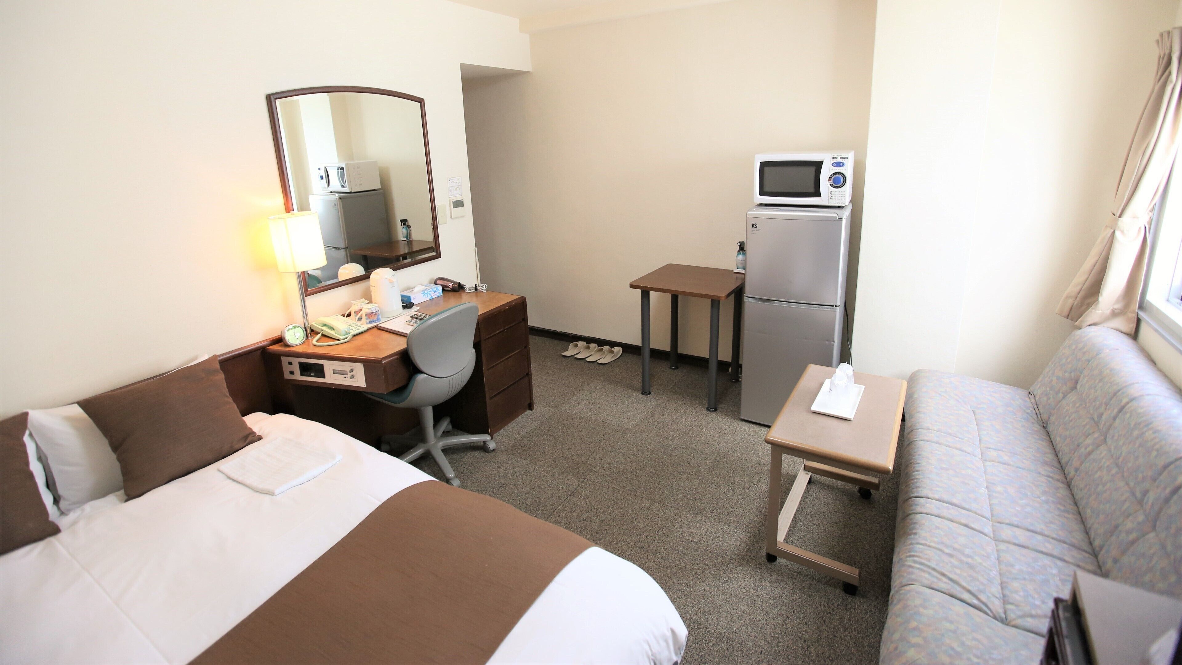 Down comforters, memory foam beds, desk, blackout drapes