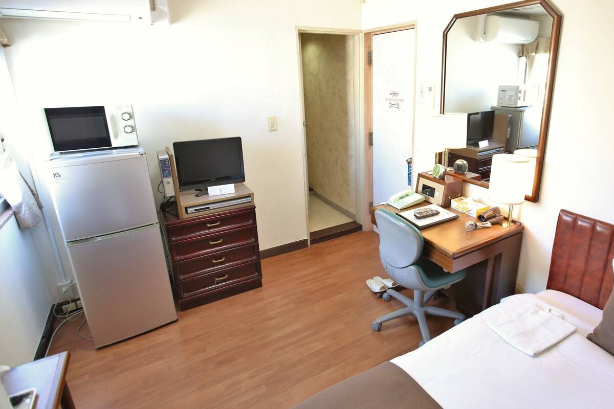 Down comforters, memory foam beds, desk, blackout drapes