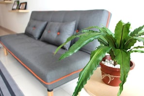Apartment, 3 Bedrooms | Living room | Flat-screen TV