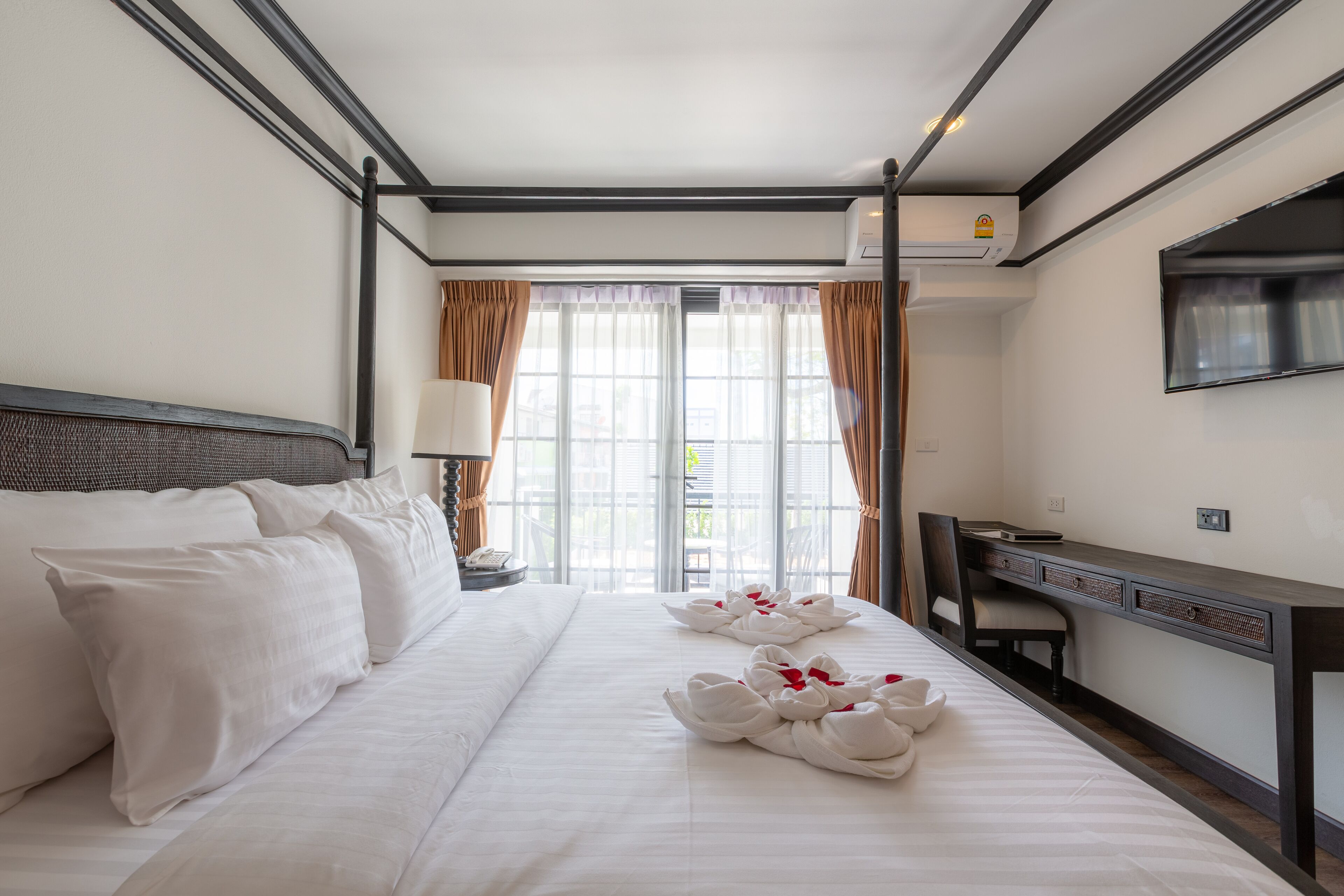 deluxe room with pool view | balcony view