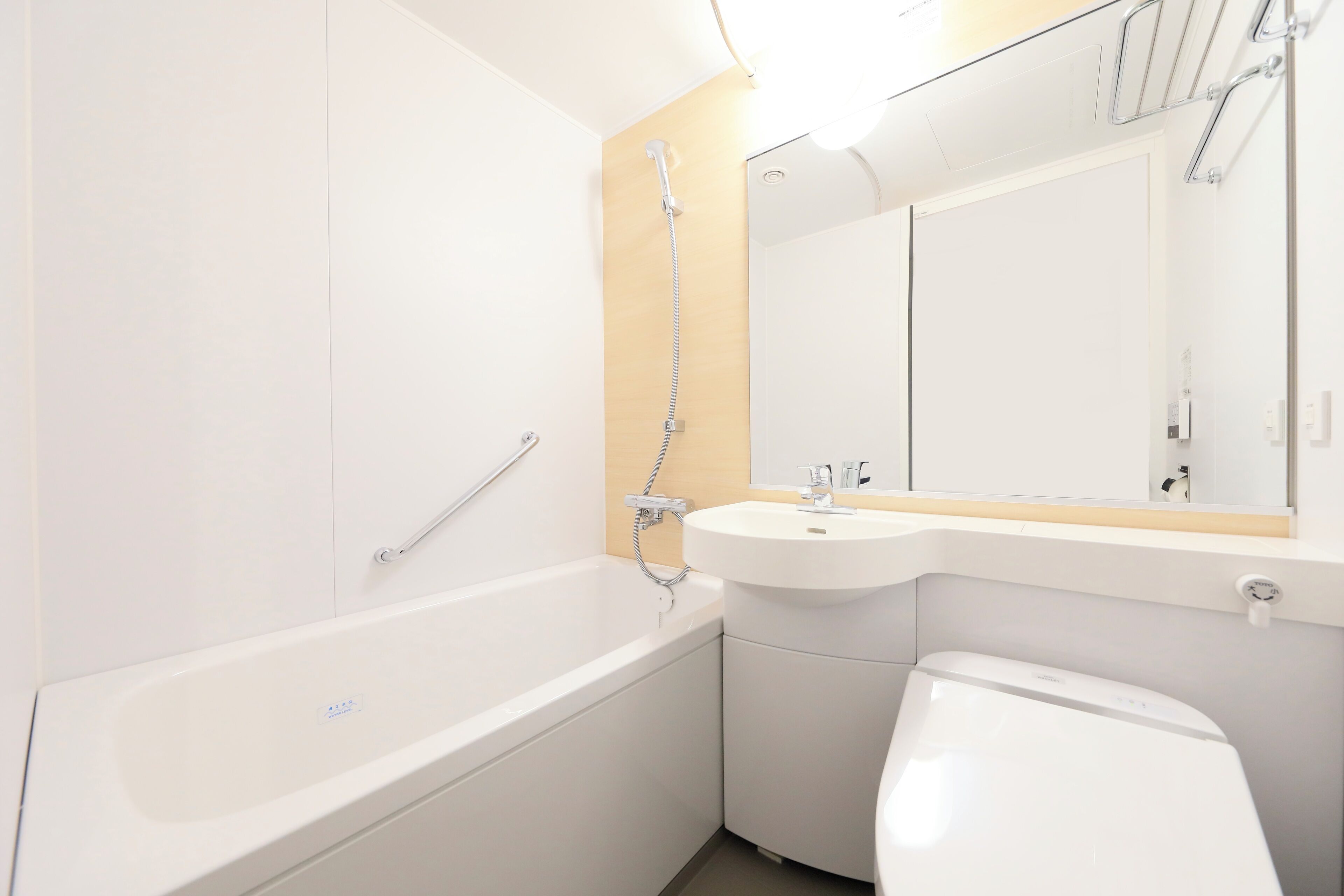 eco-friendly toiletries, hair dryer, slippers, bidet