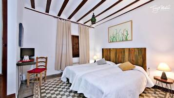 Couette en duvet d'oie, rideaux occultants, fer et planche Ă repasser