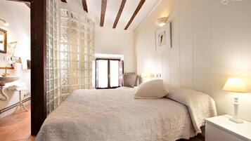 Down comforters, blackout drapes, iron/ironing board, free WiFi