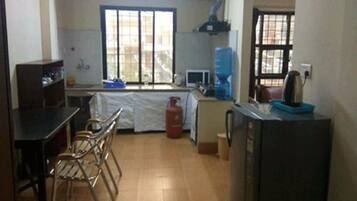 Fridge, microwave, stovetop, cookware/dishes/utensils
