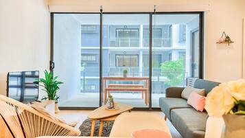 Deluxe Apartment, 2 Bedrooms | Living room | LED TV