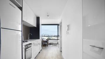 Deluxe Apartment, 1 Bedroom | Private kitchen | Fridge, microwave, oven, stovetop