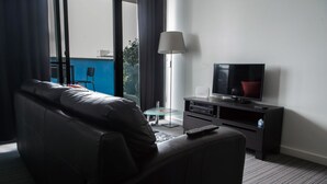 Deluxe Apartment, 1 Bedroom | Living area | LED TV - City Pad with Balcony and Laundry (Adelaide)