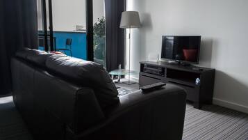 Deluxe Apartment, 1 Bedroom | Living area | LED TV
