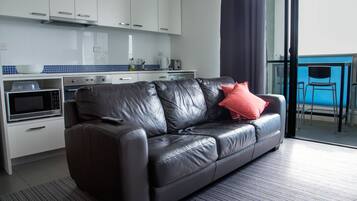 Deluxe Apartment, 1 Bedroom | Living area | LED TV