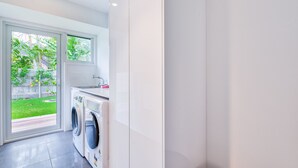 Laundry - Vibrant 4 Bedroom Home, 600m From the Beach (Burleigh Waters)