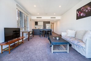 Superior Condo, 4 Bedrooms | Living area | LED TV