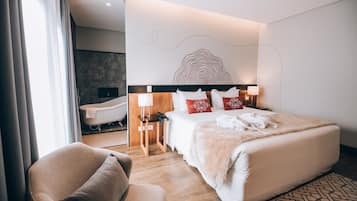 Suíte premium, 1 cama King, para não fumantes | Roupas de cama premium, frigobar, cofres nos quartos, cortinas blackout