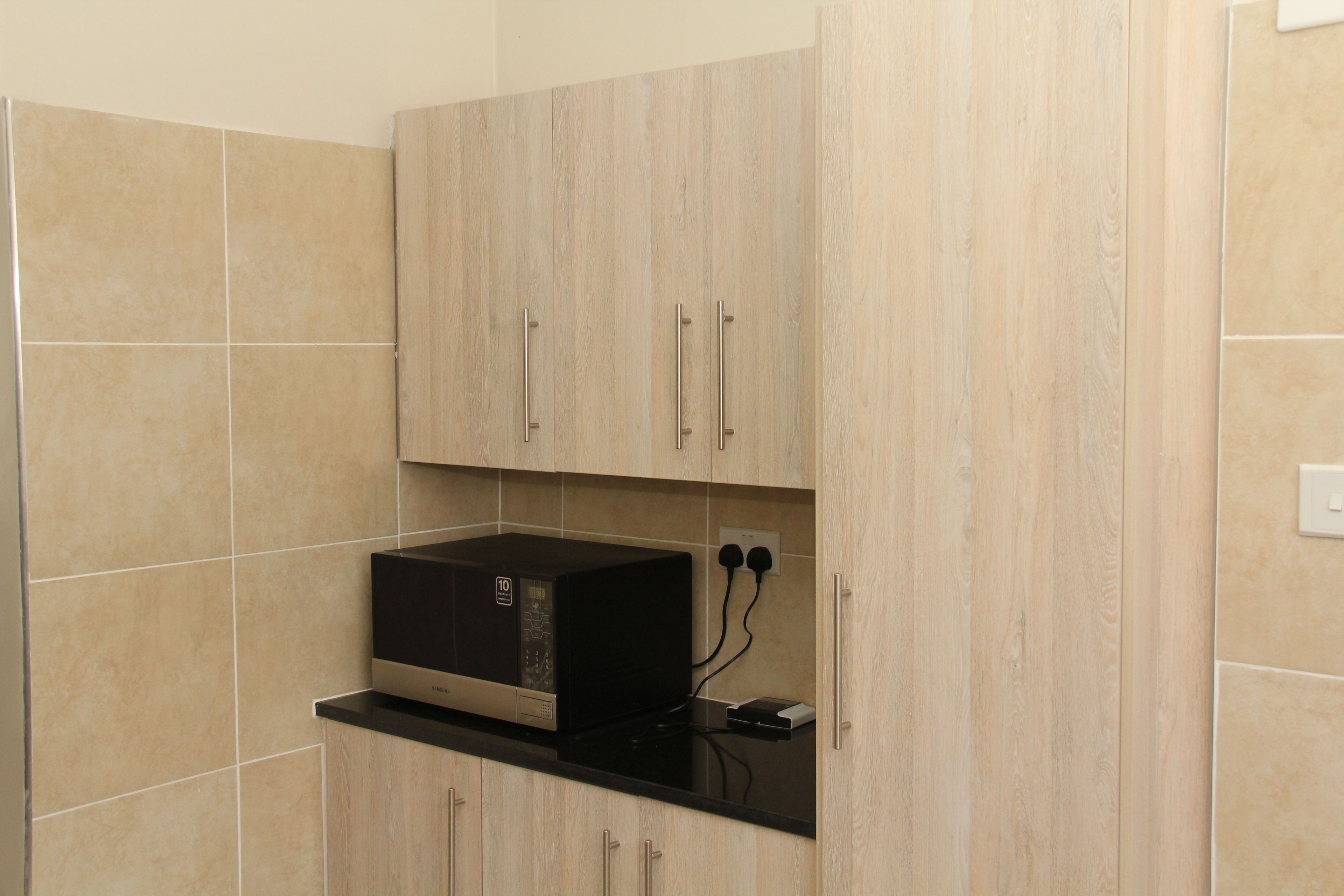 Familienapartment, Mehrere Betten, Nichtraucher, Gartenblick | Eigene Küche | Kühlschrank, Mikrowelle, Ofen, Kochgeschirr/Geschirr/Besteck