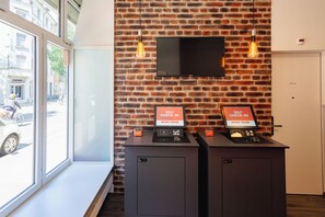 Check-in/check-out kiosk