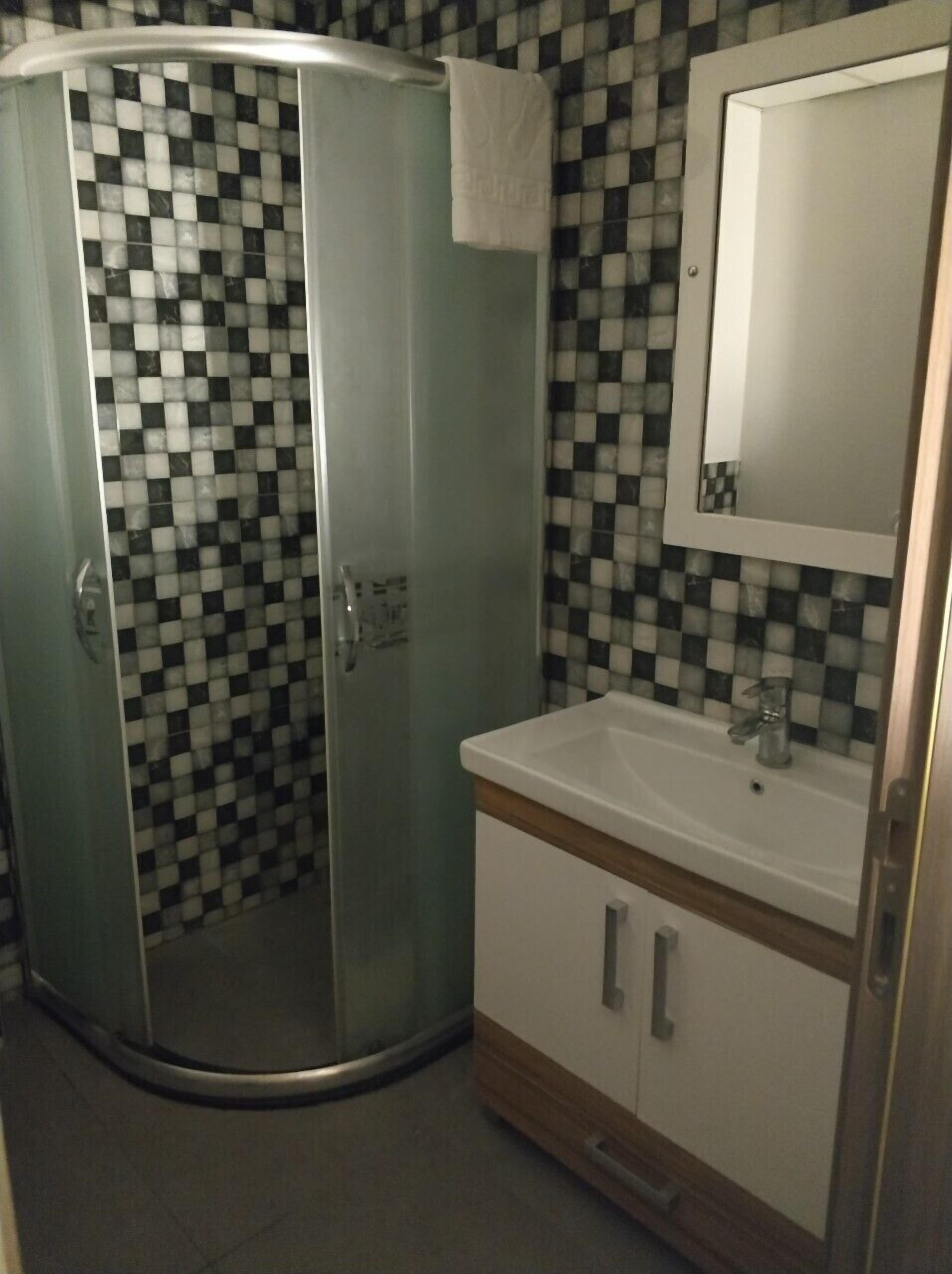 standard room | bathroom | shower, rainfall showerhead, designer toiletries, hair dryer