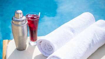 Seasonal outdoor pool, open 8:30 AM to 8:00 PM, free cabanas