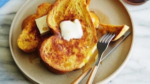 A plate with French toast and butter. - Ubud Asri Homestay (Ubud)